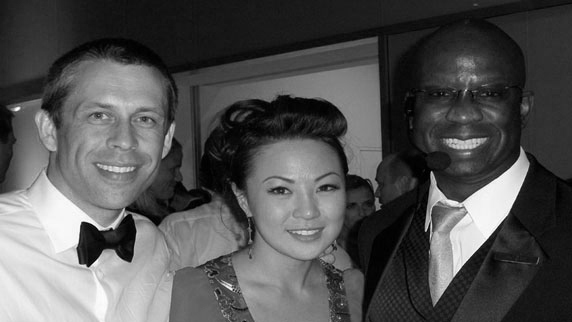 David Shoemaker and Jennifer Hsiung pose with DJ Carl BF Williams at the Tampa Museum of Art